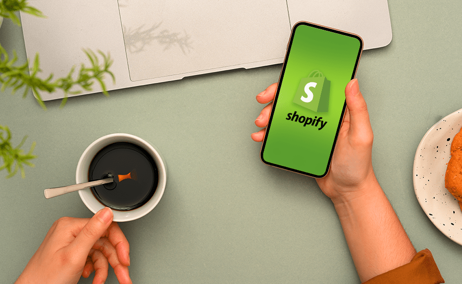 Shopify logo on smartphone